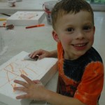 boy making art